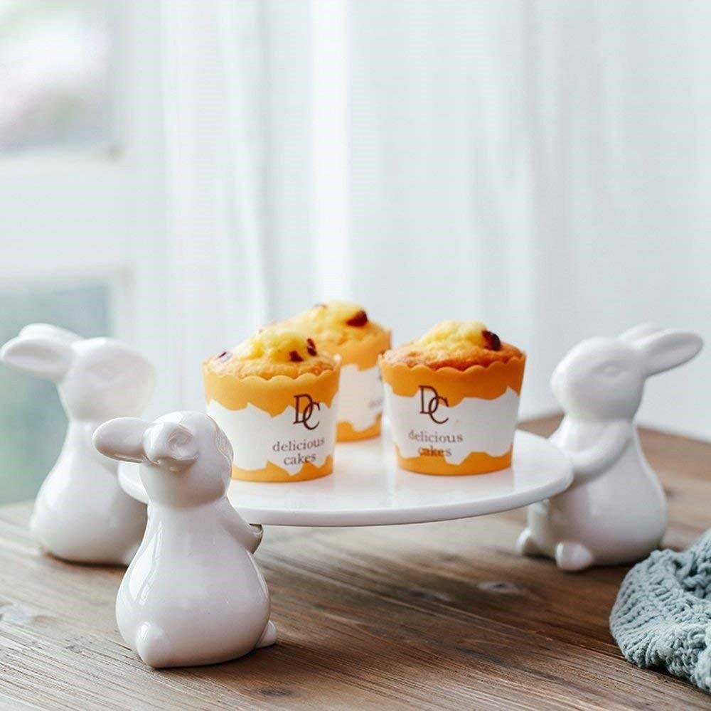 Porcelain cake plate with white rabbit foot holder